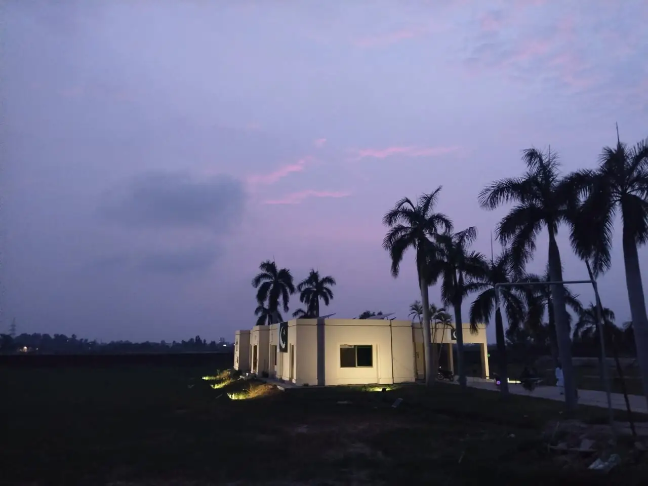 Kunjwal City site office — on-site view at dusk