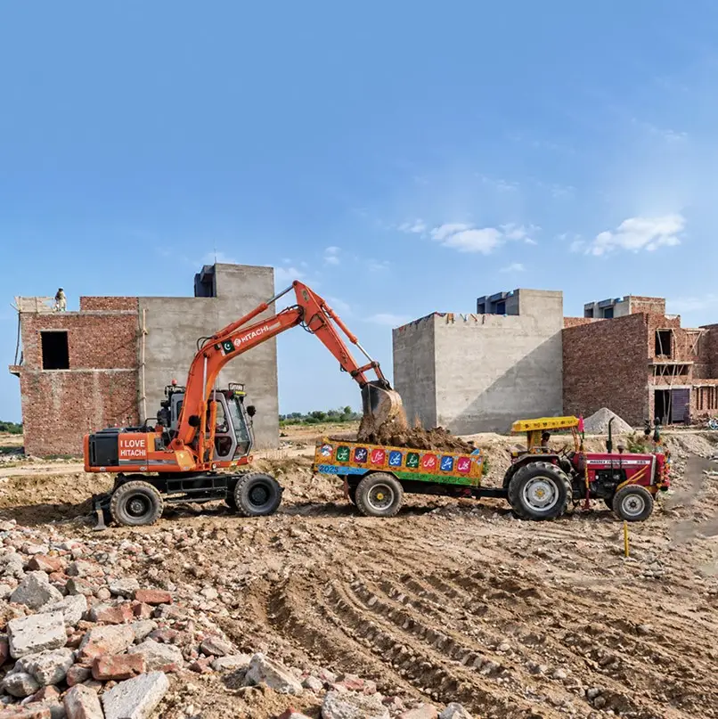 Earthworks beside the first house structures, Kunjwal City Gujrat — site photo, 15 October 2026