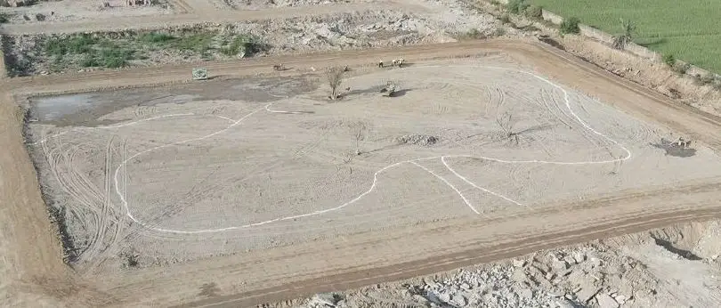 Future park, marked out on bare ground, Kunjwal City Gujrat — site photo, Before May 2026