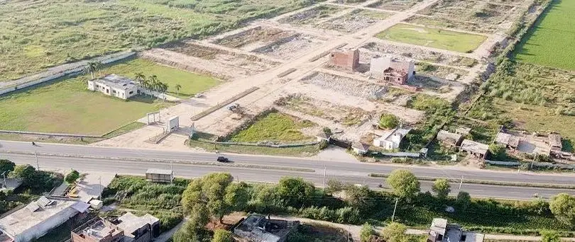 Kunjwal City frontage on Sargodha Road, Gujrat, September 2026