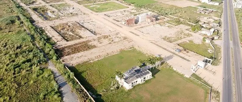 Streets and the first houses, Kunjwal City, September 2026